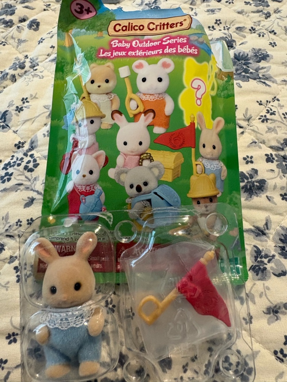 Calico Critters Beige Bunny Figure with Blue Outfit and Red Flag